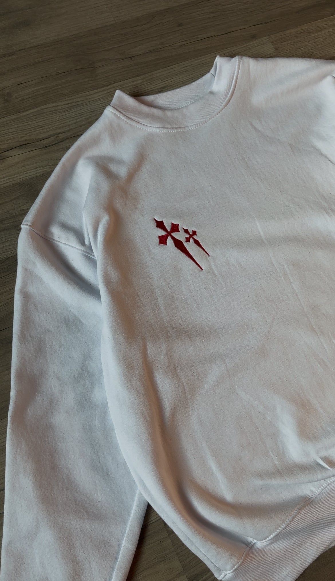 Sacred hatless crewneck