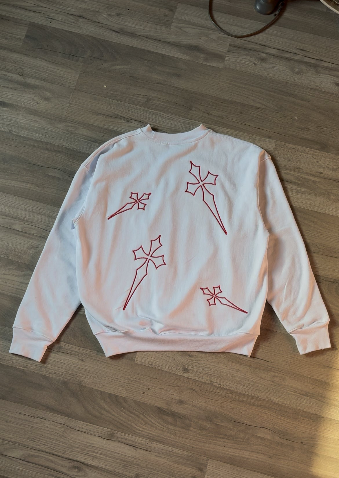 Sacred hatless crewneck