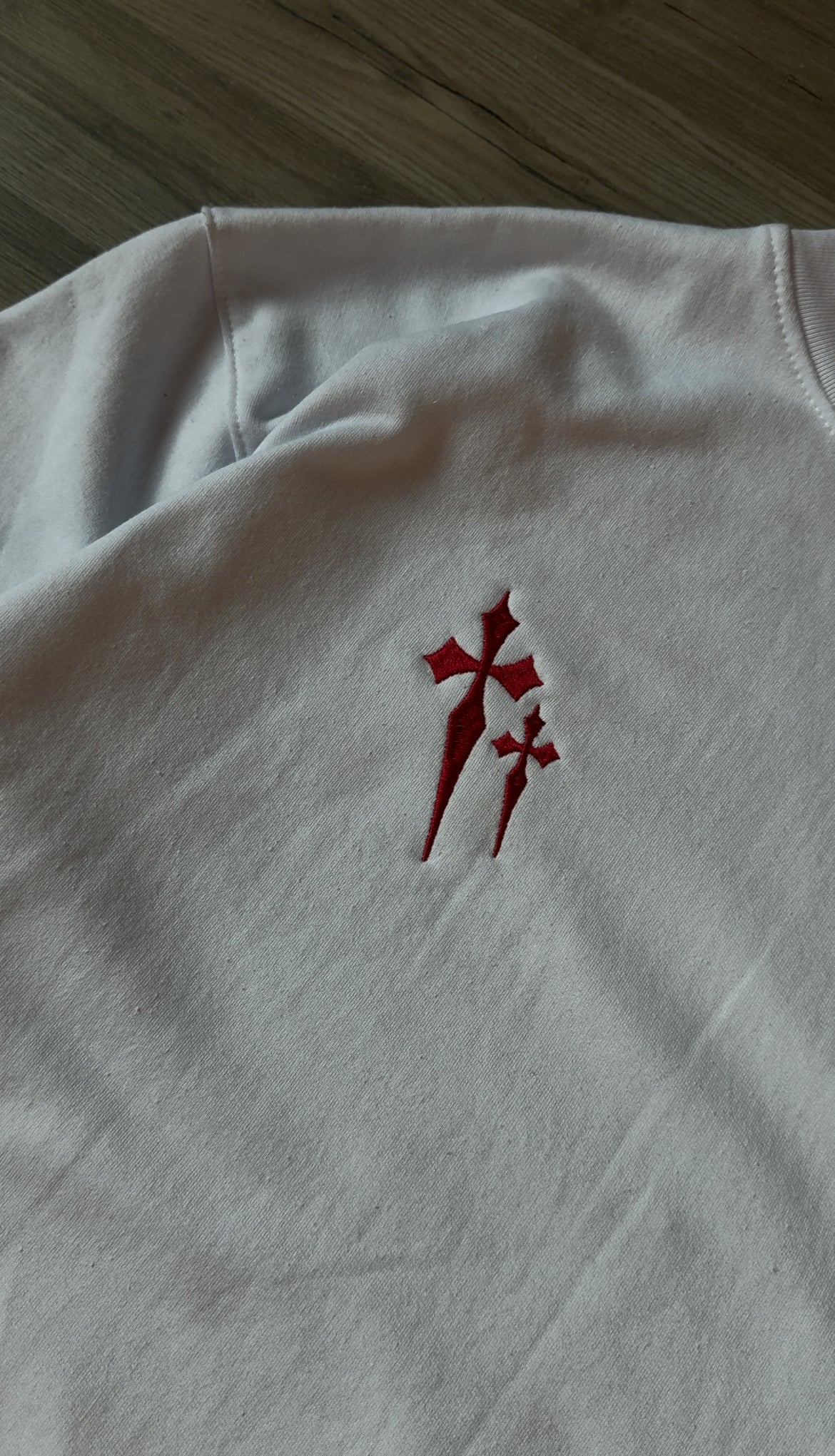 Sacred hatless crewneck